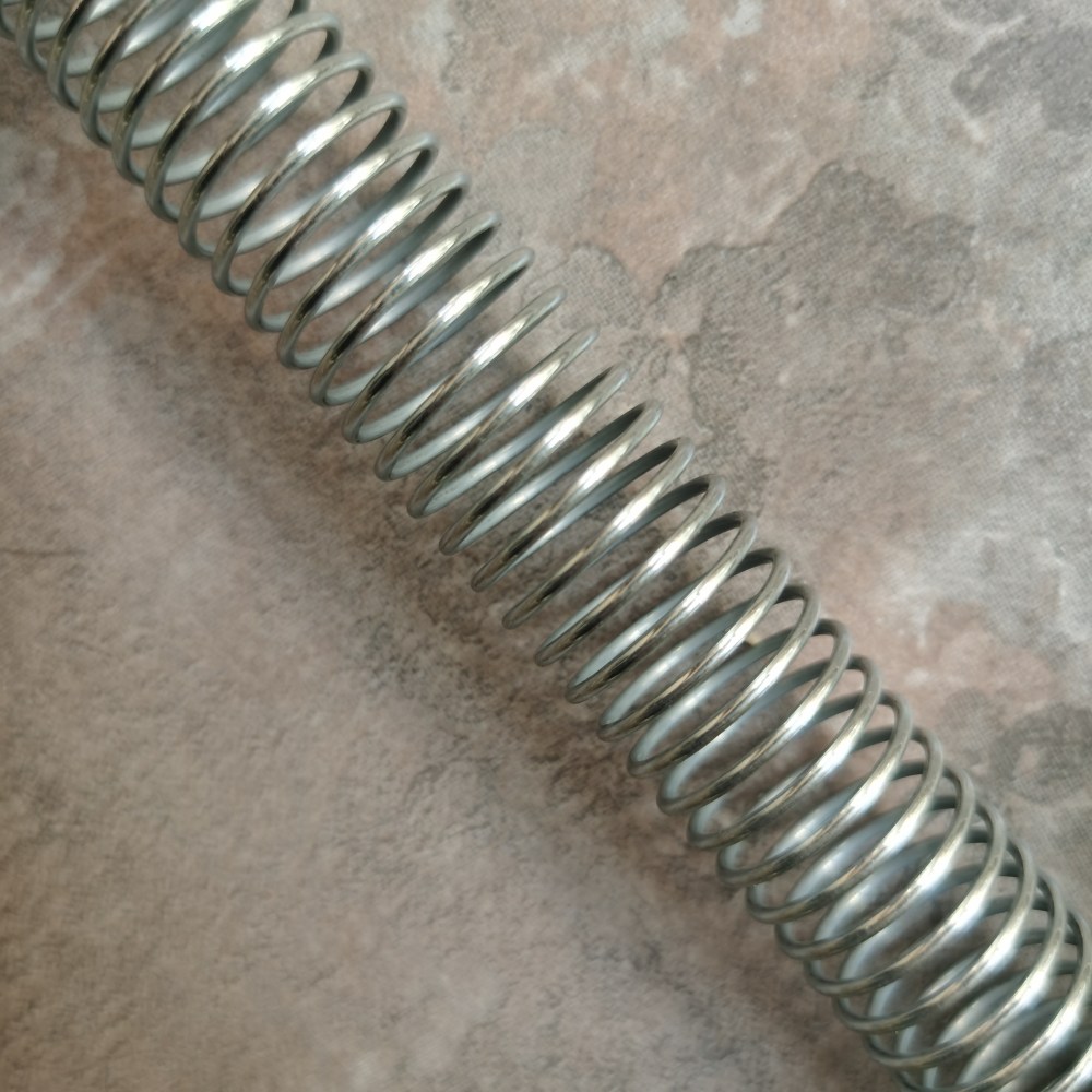 Prečo používať nerezový pružinový chránič hadice pre hydraulickú hadicu?